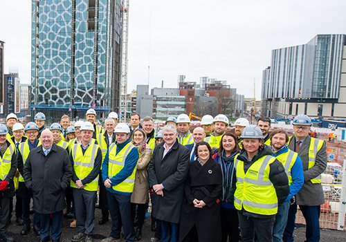 Attendees at milestone event for Royal College of physicians HQ in Paddington Village Liverpool