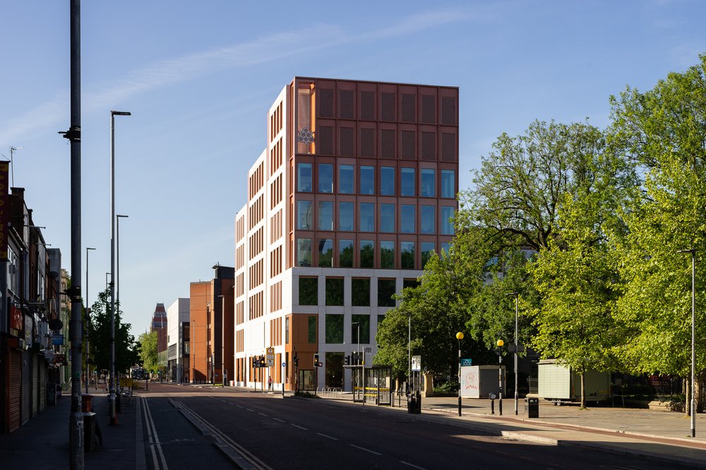 Exterior of the Manchester Metropolitan University Arts and Humanities Building, showing the new part of the building in the day time