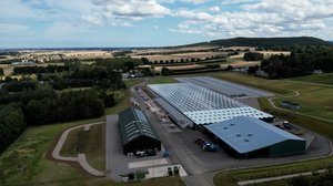 Exterior aerial of the Newton Nursery greenhouse, office building and car park
