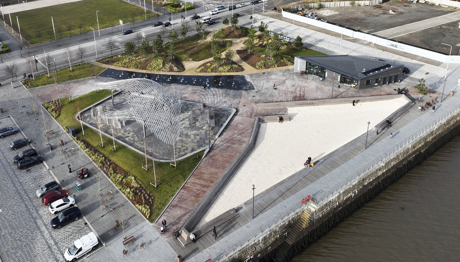 Aerial of the green space, large sandpit and walkways next to Dundee Waterfront
