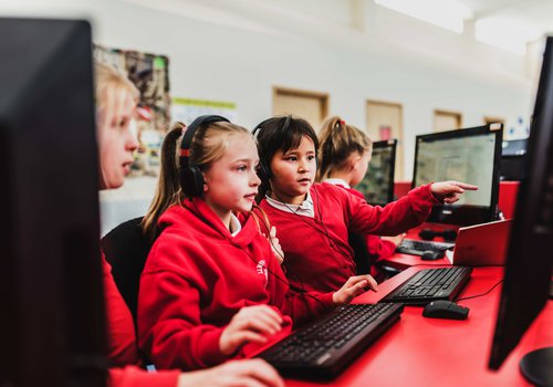 Picture of school children in red school uniform