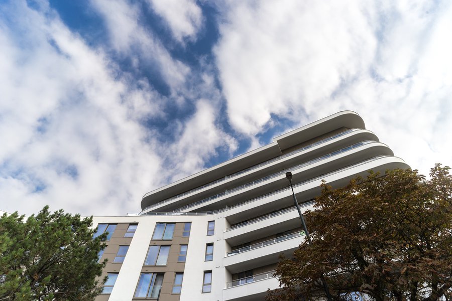 Image of the Berry Court residential development, looking upwards towards the seven-storey building