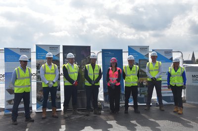 The Morgan Sindall, St Marks School and Faithful and Gould Project team on the roof of the building at the topping out event