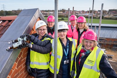 L-R Front Dr Sarah Gough, Charlotte Shawe, The Lord Lieutenant Lady Dannatt MBE. L-R Back Lady Bacon, Robert Carter DL, Sandra Dinneen MBE