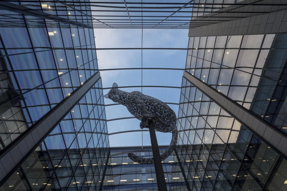 A leopard sculpture located in the centre of the glass atrium at Marischal Square in Aberdeen