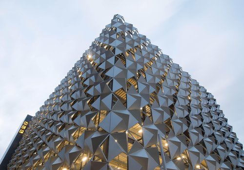 Image of the completed New Bailey Car Park in Salford, showing the architectural metal cladding surrounding the structure