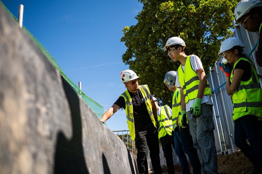 Students on tour of site