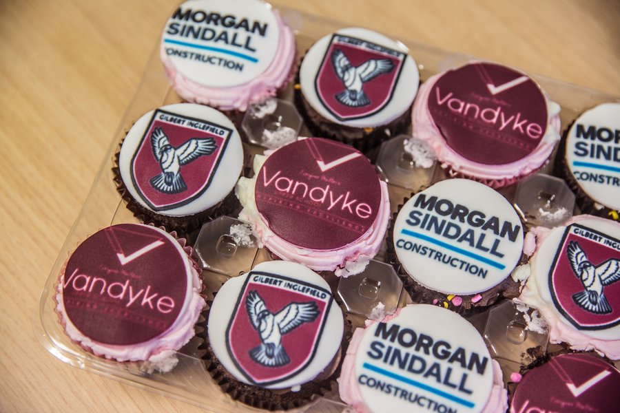 A tray of Morgan Sindall Construction and Vandyke School branded cupcakes at the schools handover event