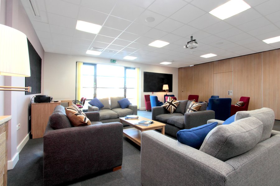 Picture of the lounge area complete with comfy sofas and decor at the Royal Marines recovery centre