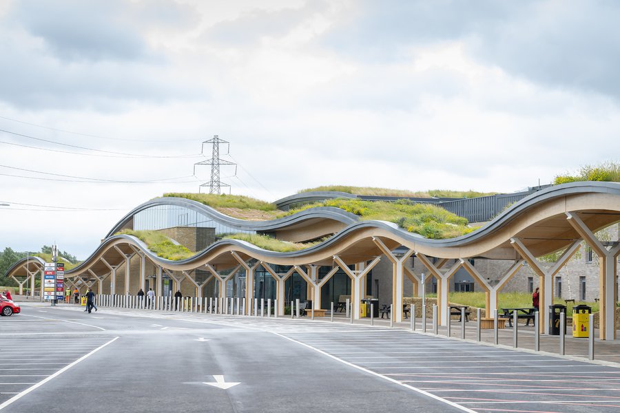 Entrance to Skelton Lakes Service station which features a wavy designed, green living roof