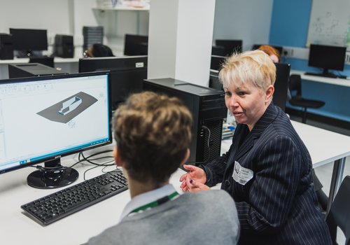 A Morgan Sindall Construction employee supporting a schools event