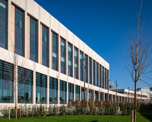 Student Life Building (foreground) and the Sports Building (right of the cathedral tower)