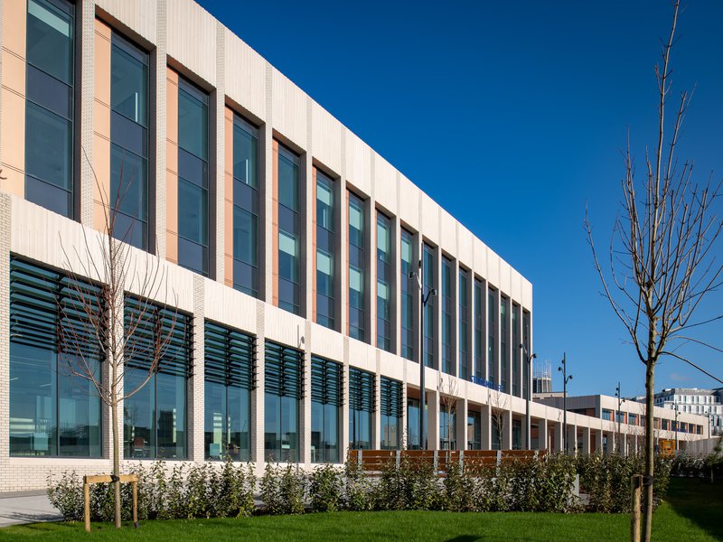 Student Life Building (foreground) and the Sports Building (right of the cathedral tower)