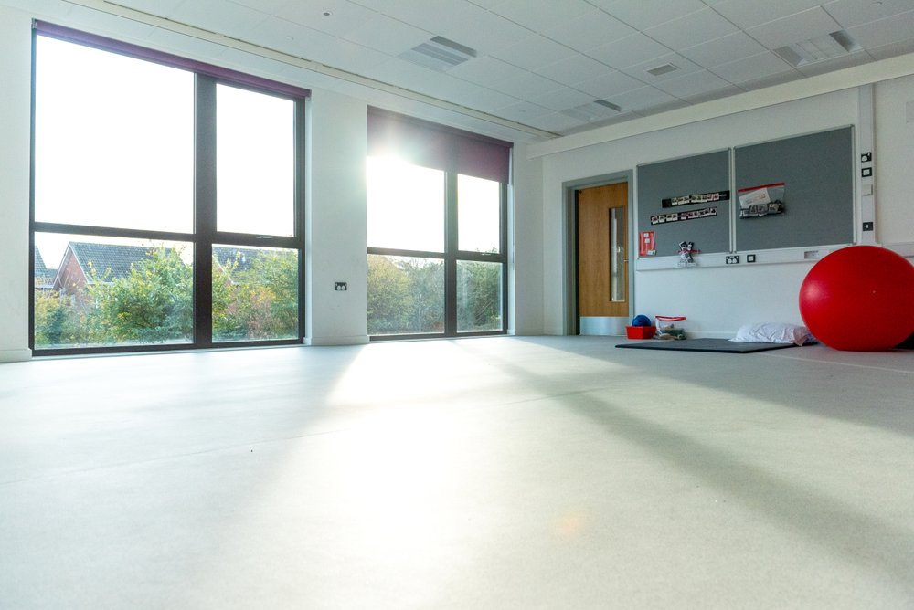 Studio classroom at the Glenwood SEN School in Essex, the image shows the large floor to ceiling windows as part of the building design