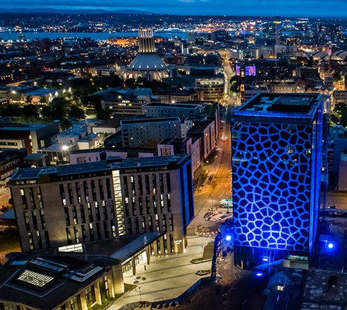 The Spine building in Paddington Village in Liverpool which was lit blue for the NHS Birthday