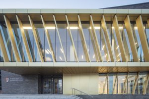 Gold brise-soleil on the front of the University of Birmingham Collaborative Teaching Lab