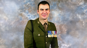 A picture of a man dressed in Armed Forces uniform