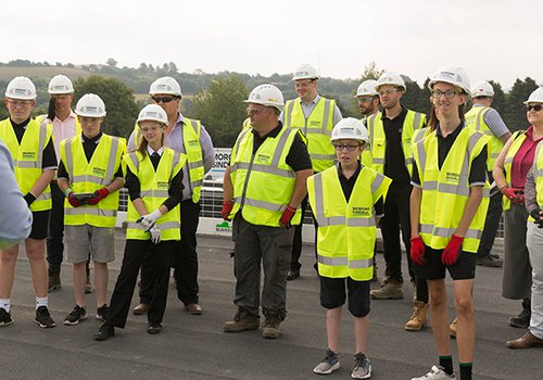 Image of the Morgan Sindall Construction team and guests at the Tonyrefail School topping out event