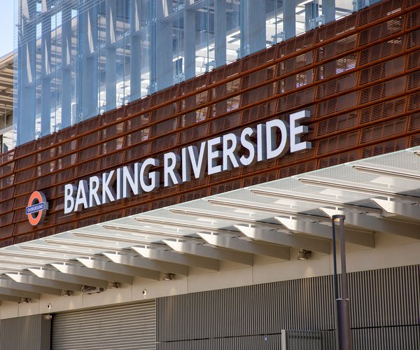 The exterior of Barking Riverside station, with the name and London Transport roundel visible