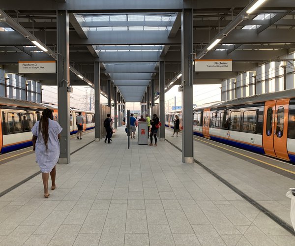 Two platforms at Barking Riverside station, each with a train waiting.