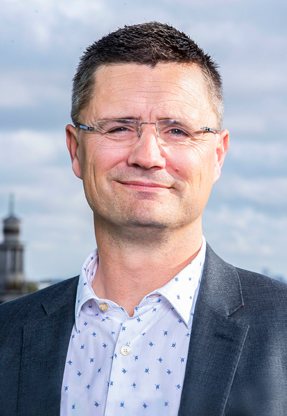 Morgan Sindall Infrastructure's Gary Shuttleworth stands smiling at the camera