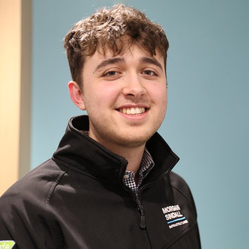 Morgan Sindall Infrastructure colleague James Colley looks at the camera, smiling.