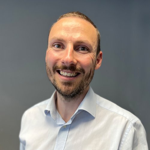 Morgan Sindall Infrastructure colleague Mike Shirley stands smiling at the camera