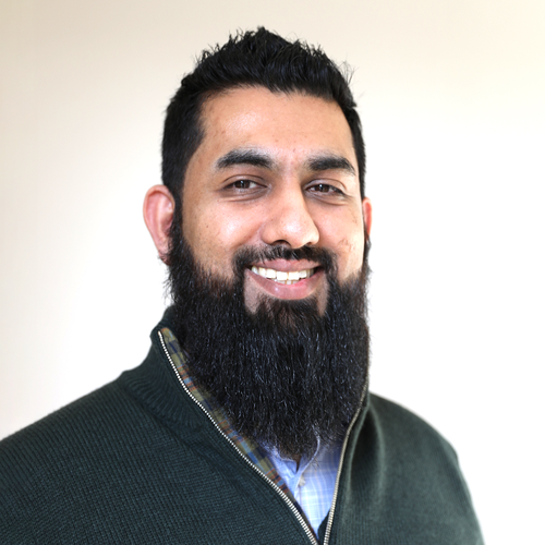 A photograph of Morgan Sindall Infrastructure colleague Zak Akhtar, looking at the camera and smiling