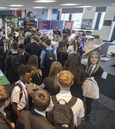 A packed exhibition hall at the Festival of Work 2025